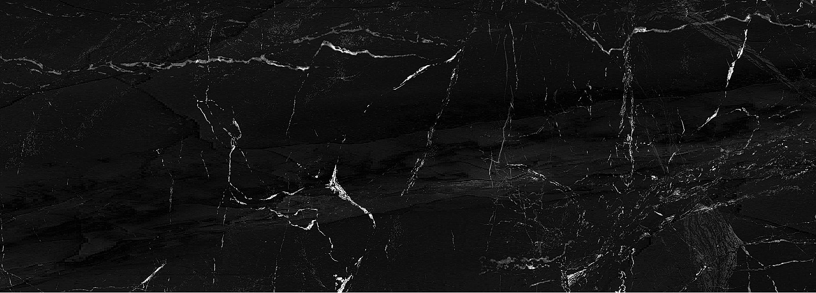 Black marble texture with white veining.